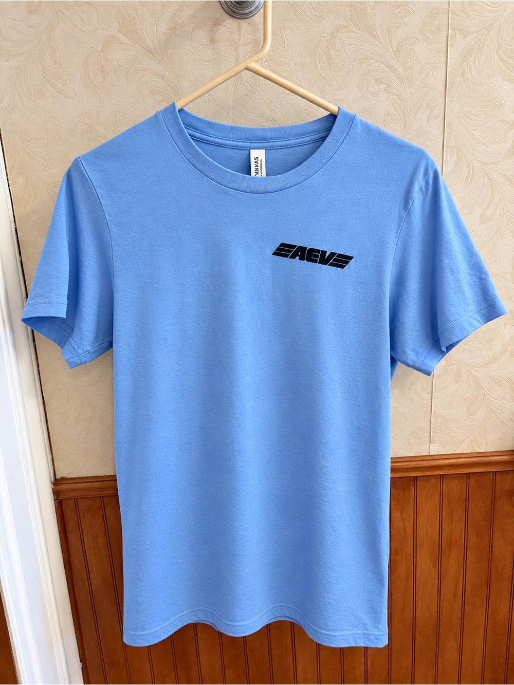 Bella Canvas Sky Blue Short Sleeve Tee with Small Black Logo